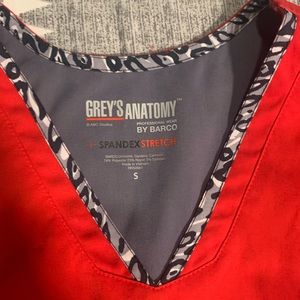 Red and leopard scrub top